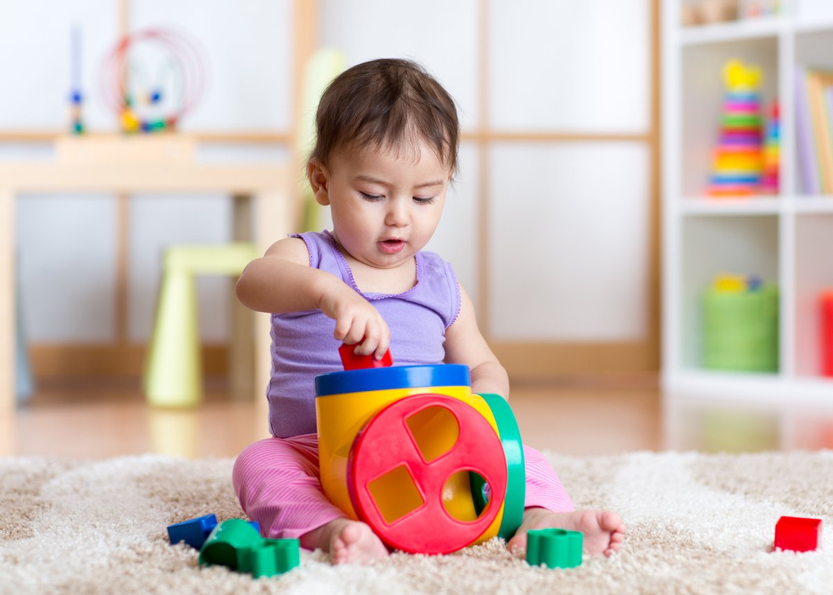 baby play with with toys for infant
