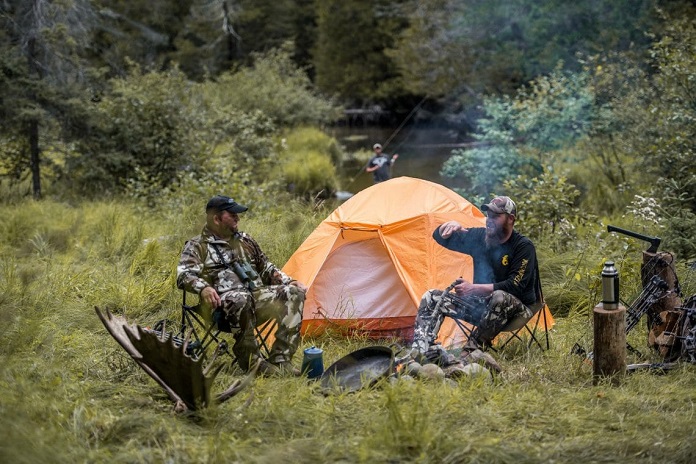 hunters camping near river