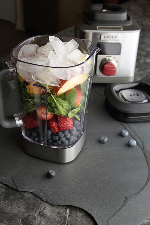 blender with fruit in it