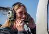women pilot with aviation headset