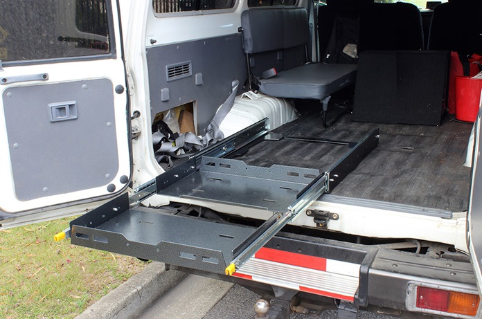 a durable and quality fridge slide mounted in the back of a truck